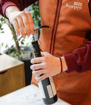 Opening a bottle of wine